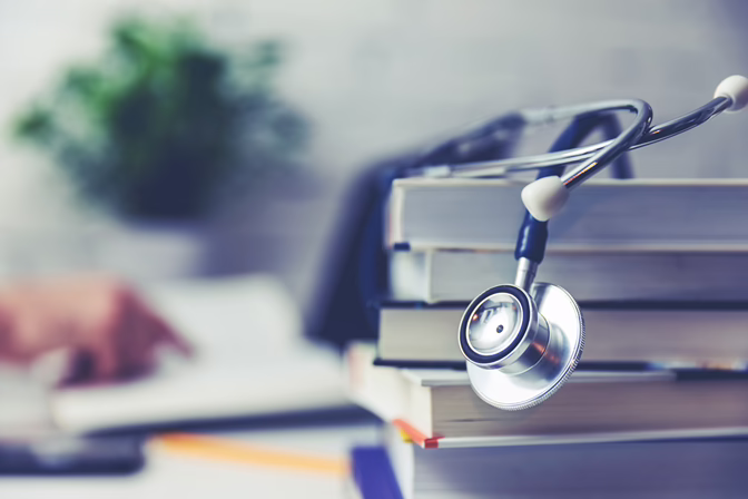 Image of books and stethoscope